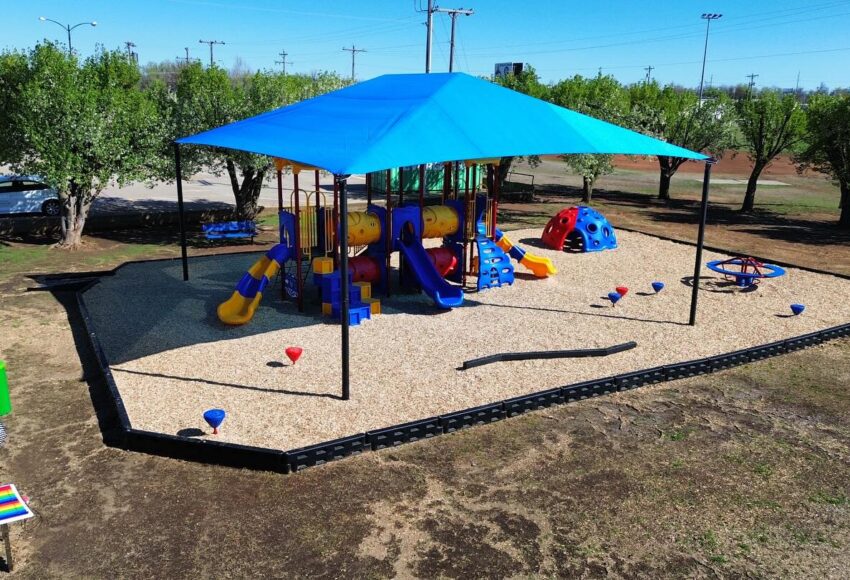 Complete playground with variety of playground equipment.